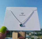 Collar Estrella de Cristal Azul · Plata